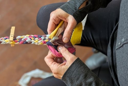 close up of colourful fabric braiding